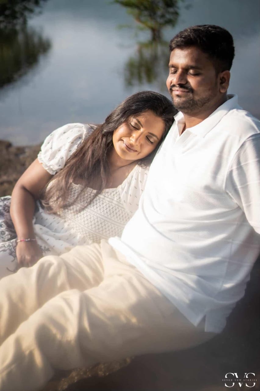 Original seated portrait photograph of the couple